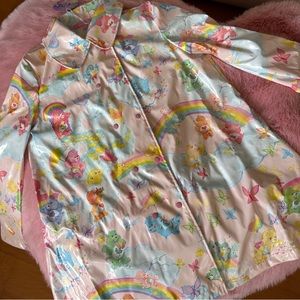 New Care Bears x Dolls Kill Pastel Pink Raincoat